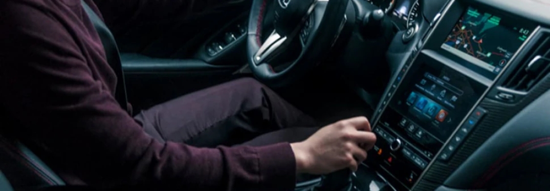 Man Driving INFINITI Q50