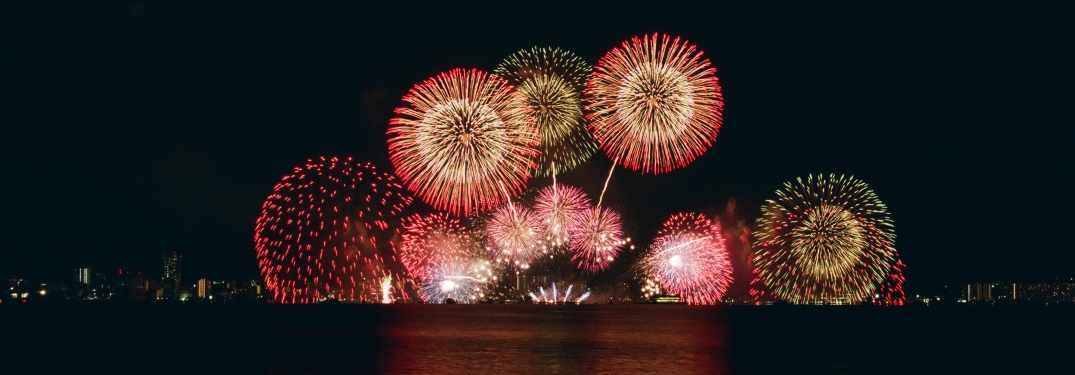 Fireworks over Water at Night