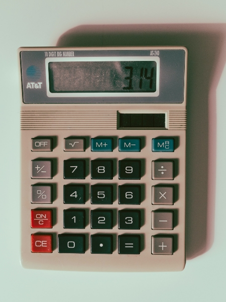 Calculator showing 3.14 on screen