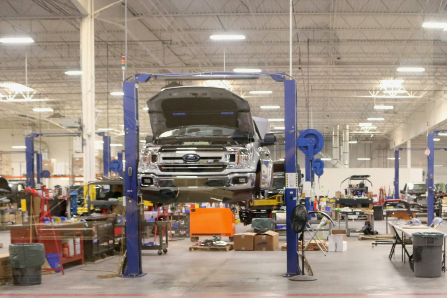Car on a Lift in an Auto Shop