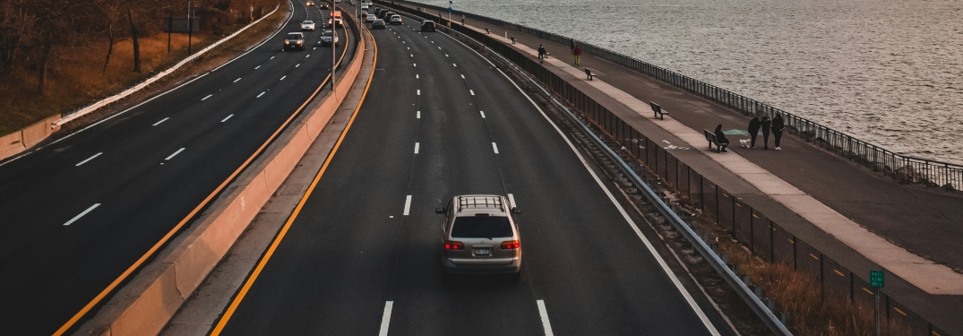 Car Driving on Coastal Highway