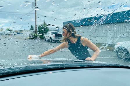 Woman washing car