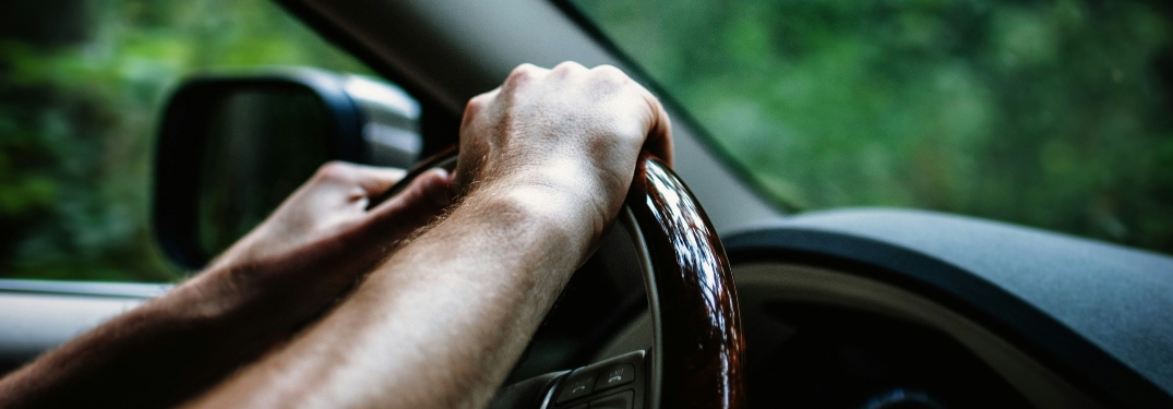 Hands on steering wheel